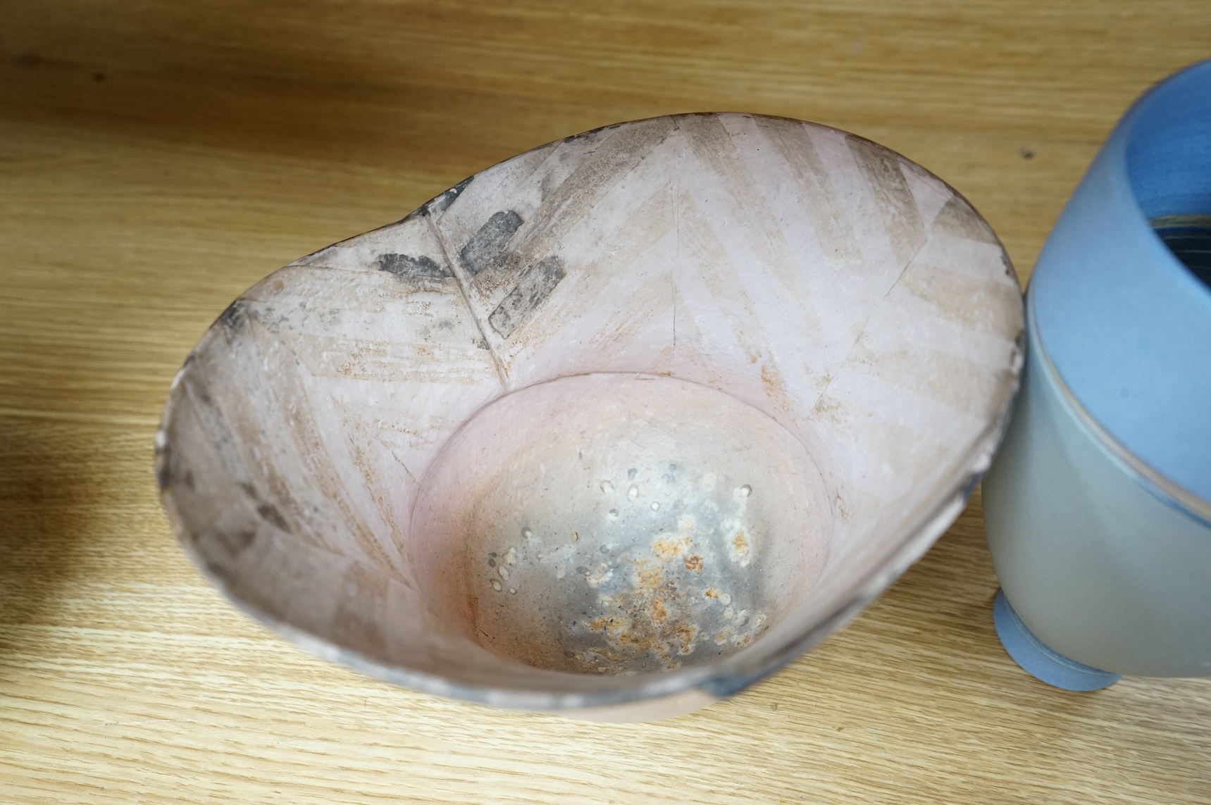 A studio pottery with incised initialled, dated ‘73 and a similar bowl, largest 21cm in diameter